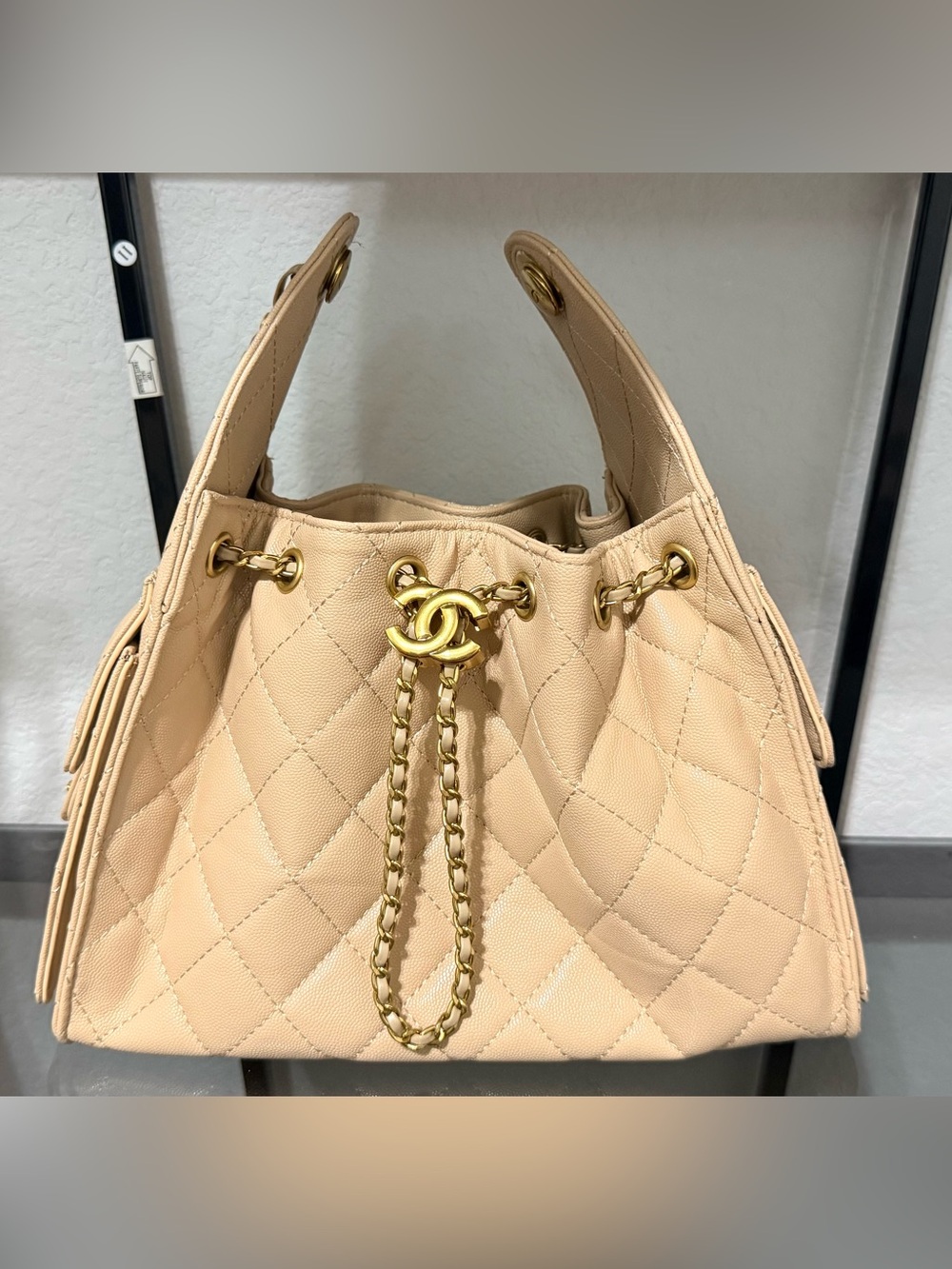 Beige Quilted Drawstring Shoulder Bag with Gold Chain